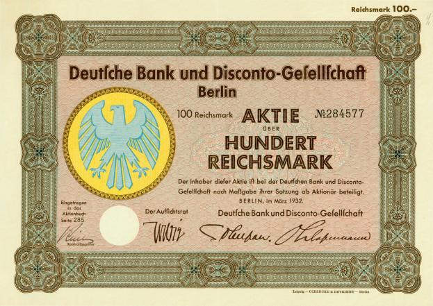Alte deutsche Banknote mit einem Vogel-Design und der Aufschrift "Deutsche Bank und Disconto-Gefellichaft Berlin".