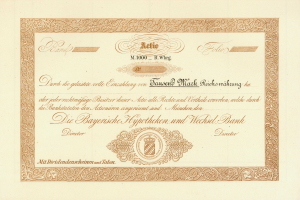 Altes Aktienzertifikat mit goldenem Rand, das ein Porträt eines Mannes und Text zeigt, wahrscheinlich eine Anleihe.