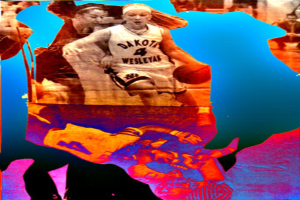 Eine Person hält einen Basketball in der Mitte des Bildes.